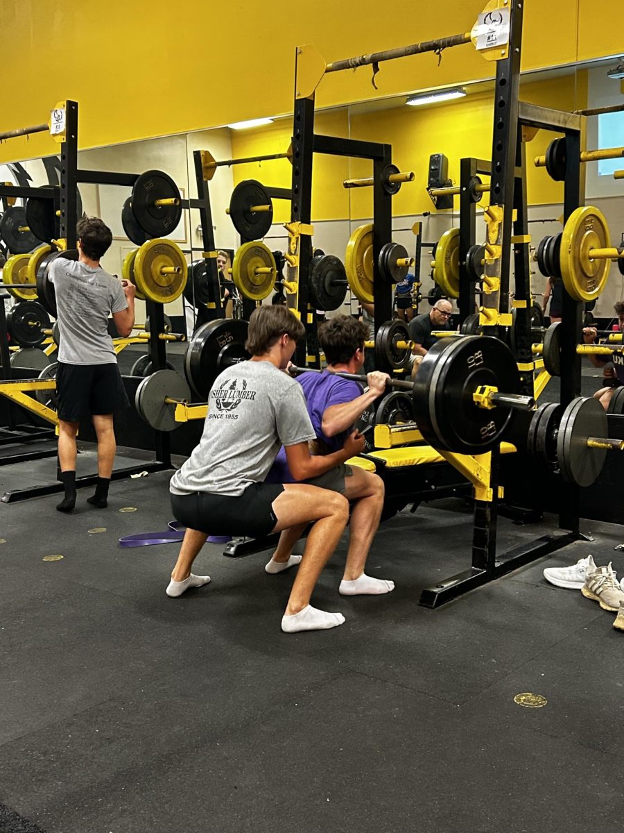 Max McGregor spots Tate Nelson for a PR squat