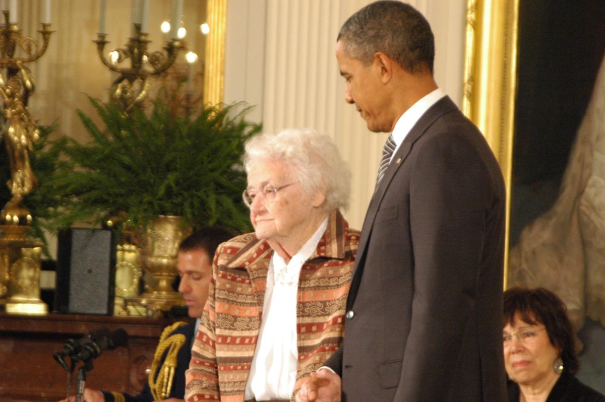President Obama presenting The National Citizen Award to Mary (Milly) Bloomquist Jr. at the White House.

