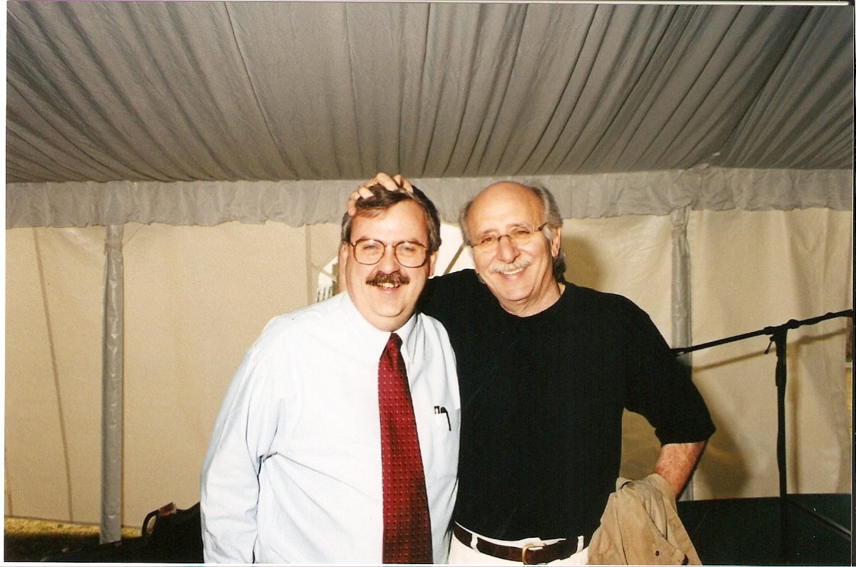 Peter Yarrow of Peter, Paul and Mary posing with Bloomquist.