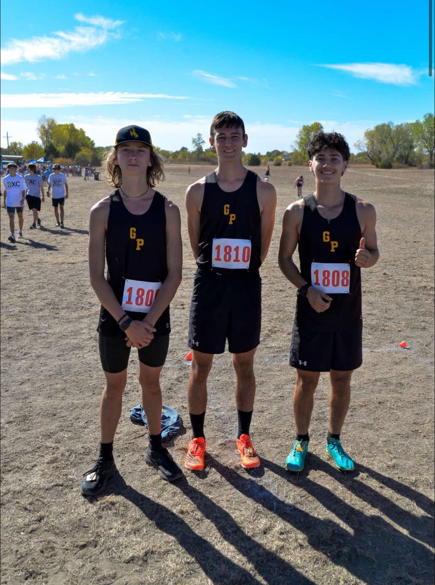 Garden Plain Cross Country athletes, Kai Laird, Logan McKim, and Arthur Boyle.